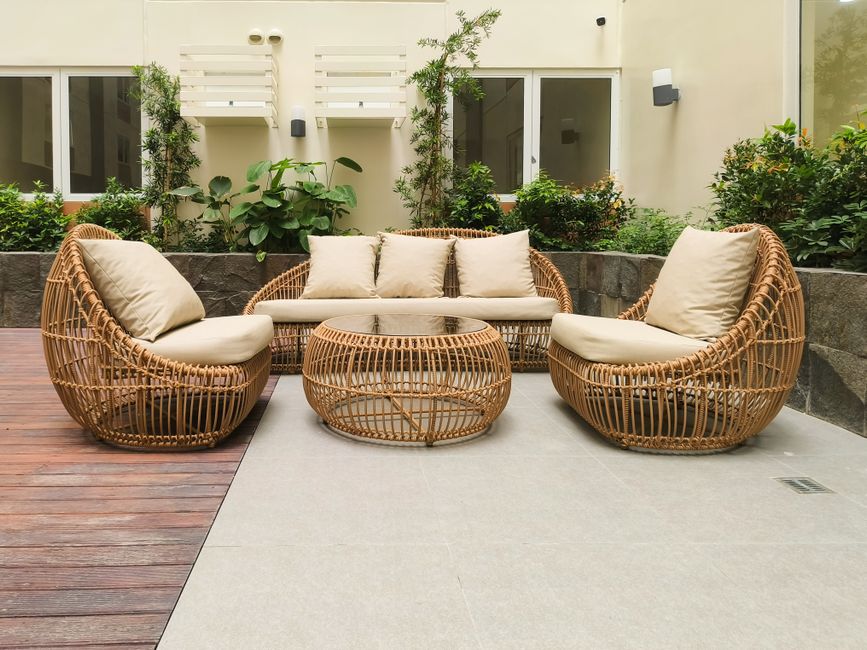 Modern patio furniture arranged on an outdoor terrace