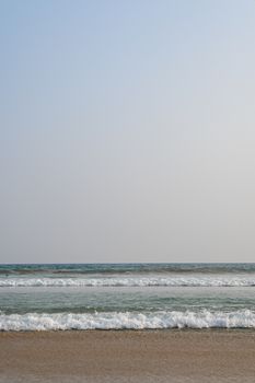 Peaceful ocean waves lapping on Ahangama beach, Sri Lanka. Perfect seascape for relaxation.