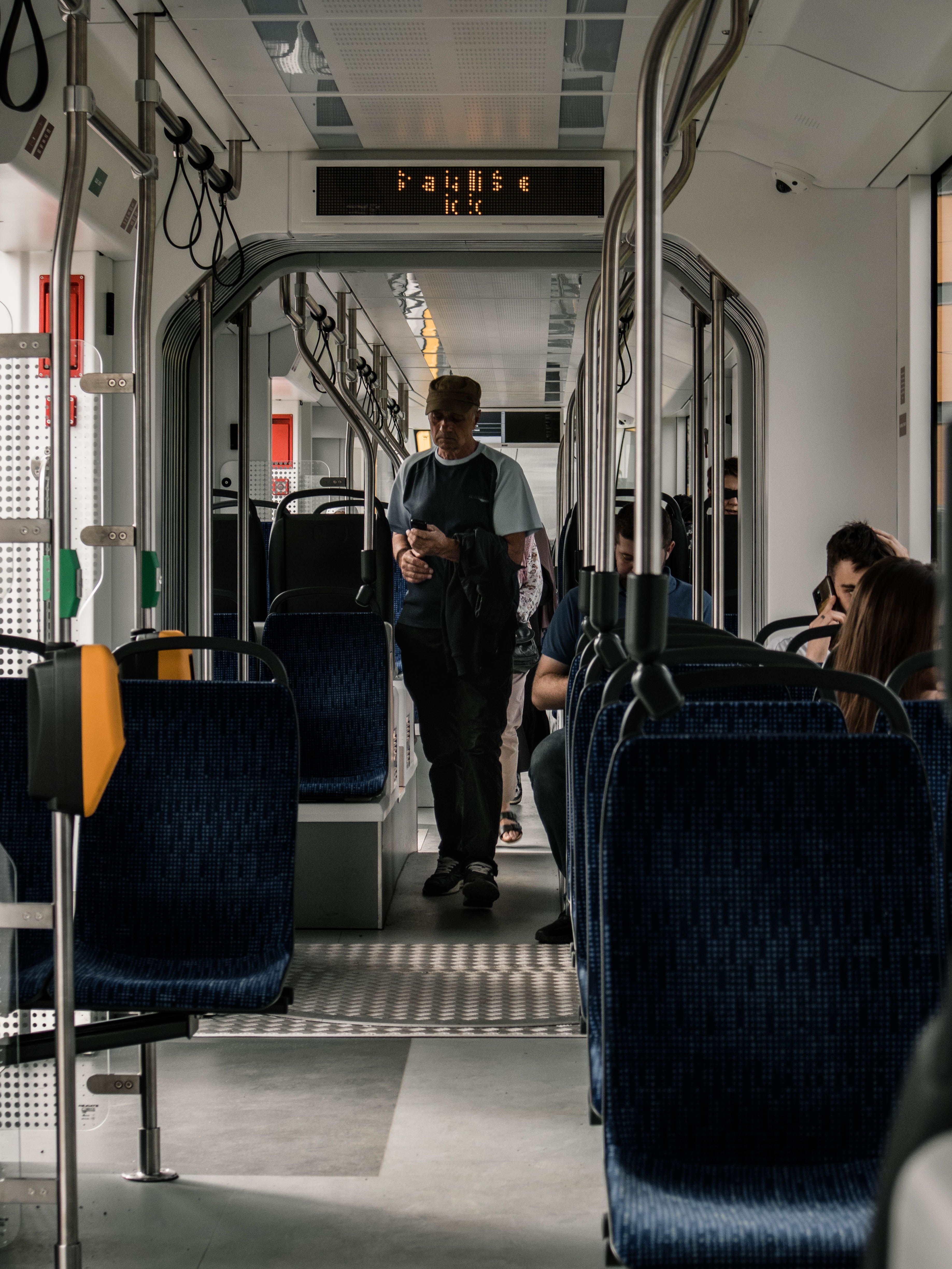 Man Walking in Tram · Free Stock Photo