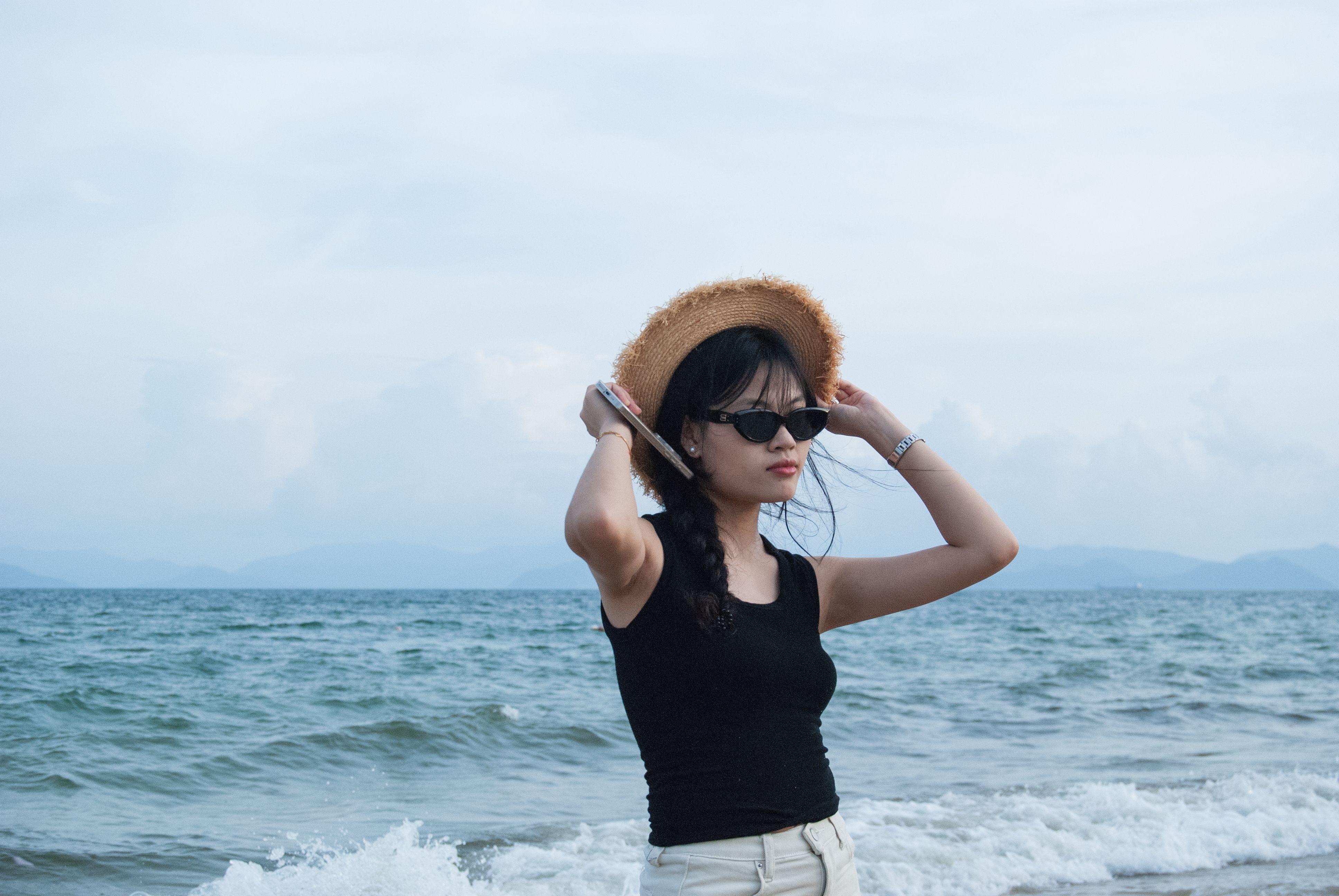 Photo of a Young Woman in a Hat and Sunglasses on the Beach · Free ...
