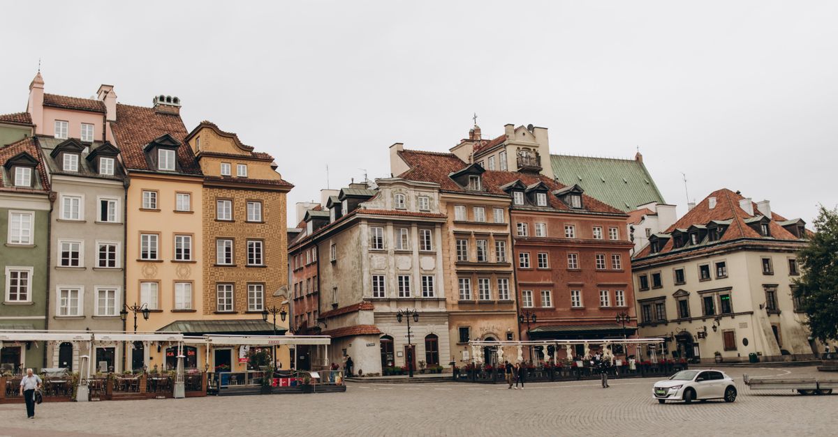 Beautiful historical buildings in Warsaw's Old Town square, a UNESCO World Heritage site.