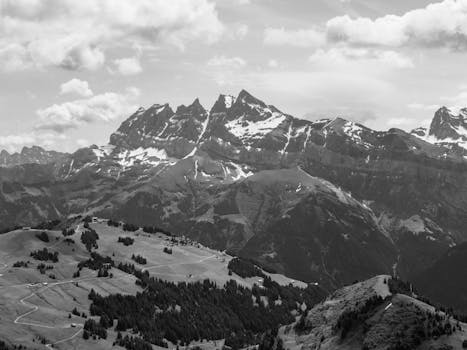 Stunning black and white view of the Dents du Midi mountain range in Champéry, Switzerland.