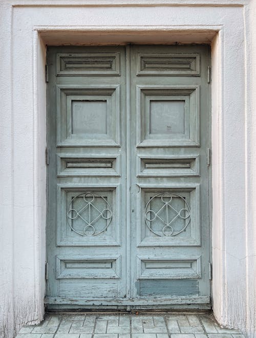 A door with a wooden frame and a window