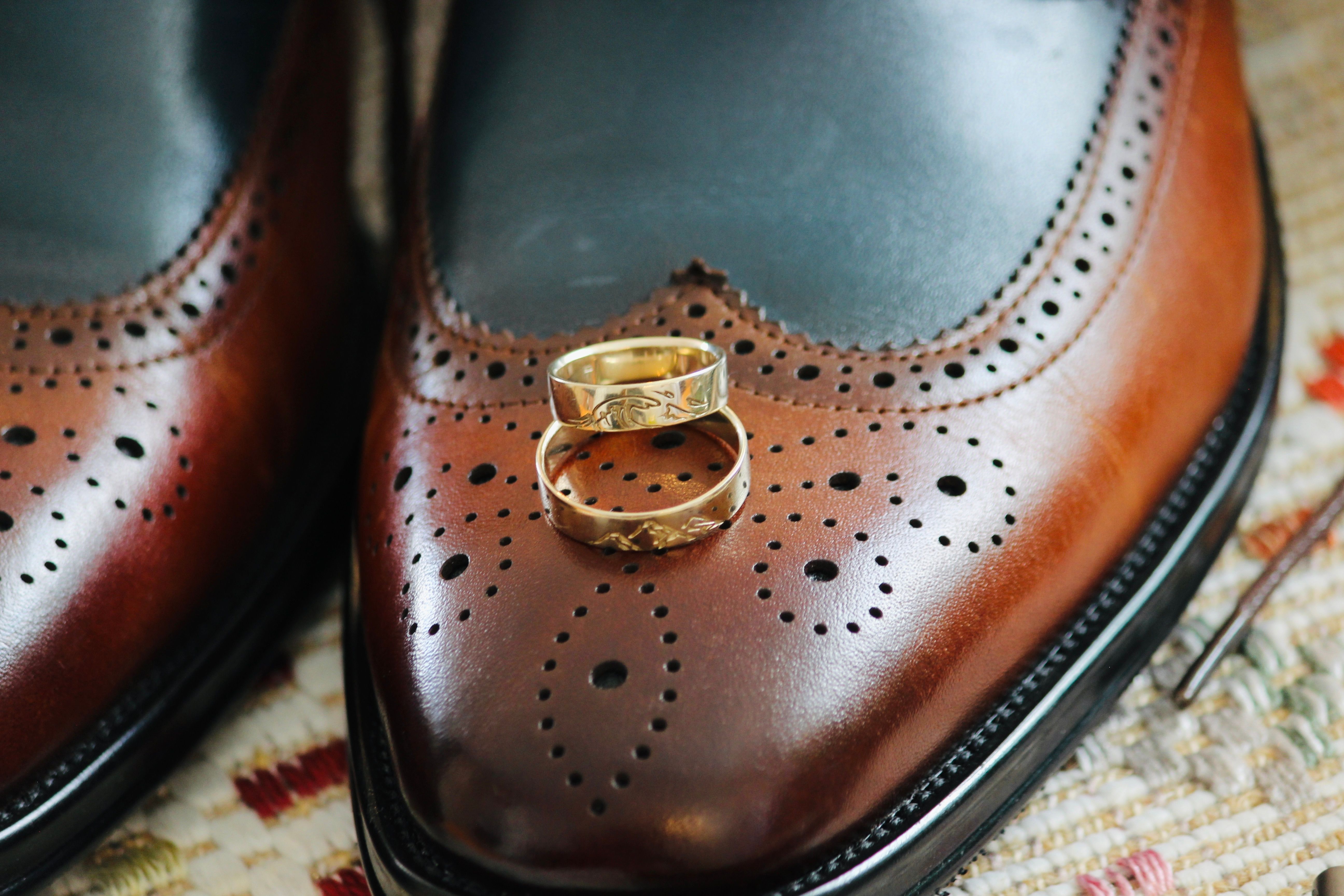 Gold Rings on Brown Shoe · Free Stock Photo