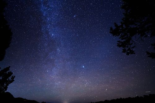 Free Beautiful star-filled night sky featuring the Milky Way and constellations. Stock Photo