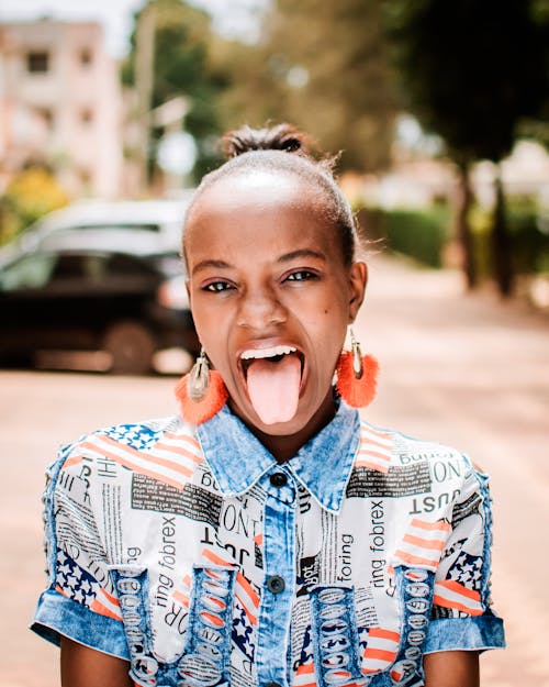 Free Photo of Girl Showing Her Tongue Stock Photo