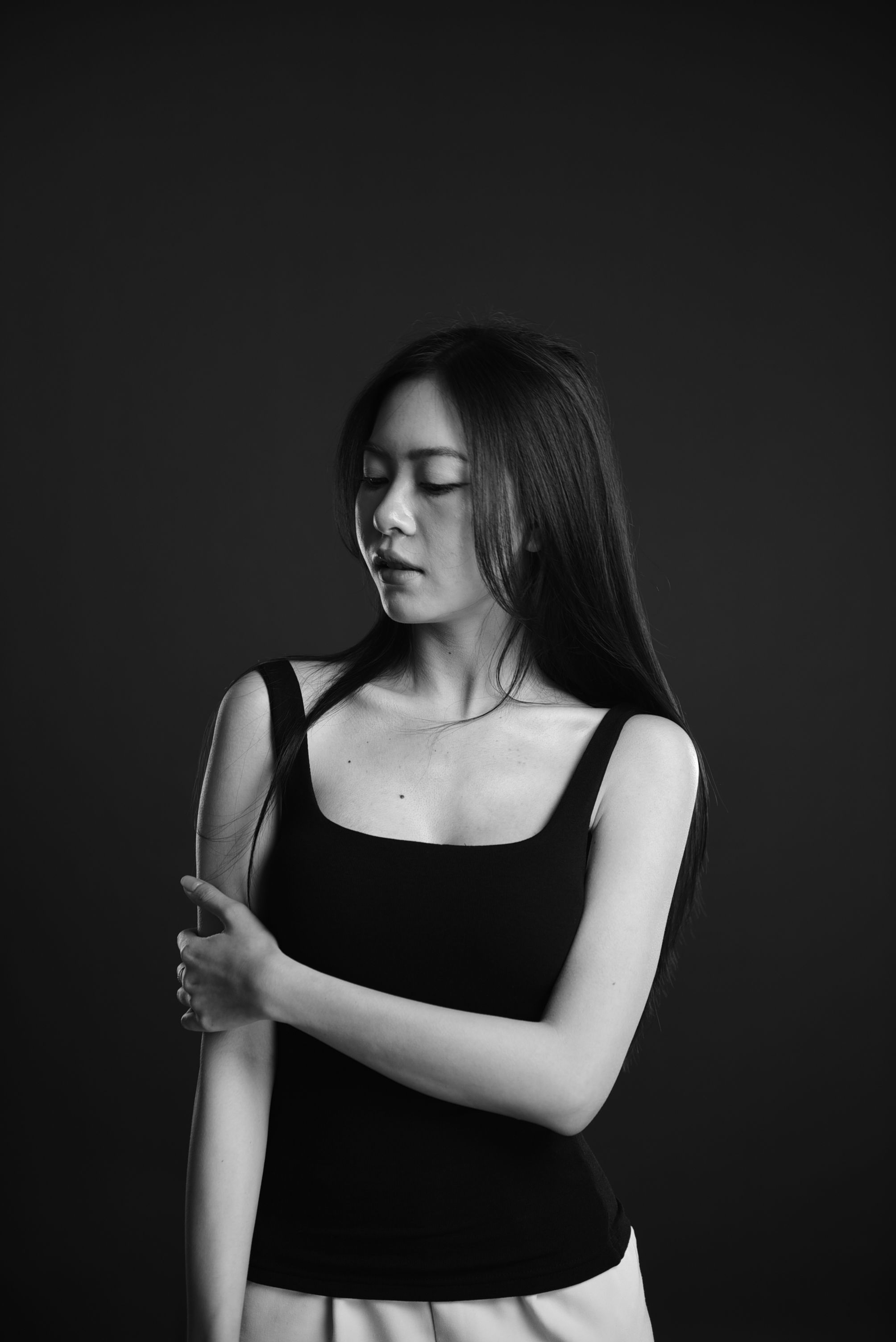 Black and White Portrait of a Woman in a Top · Free Stock Photo