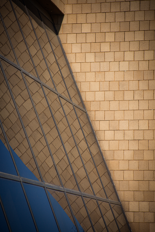 Free A captivating blend of glass and stone creating architectural reflections. Stock Photo
