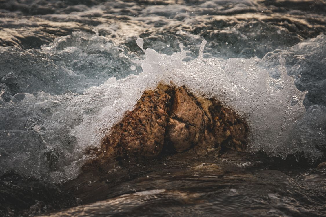 Light Bouncing Off Rocks Water Bouncing off a Stone · Free Stock Photo