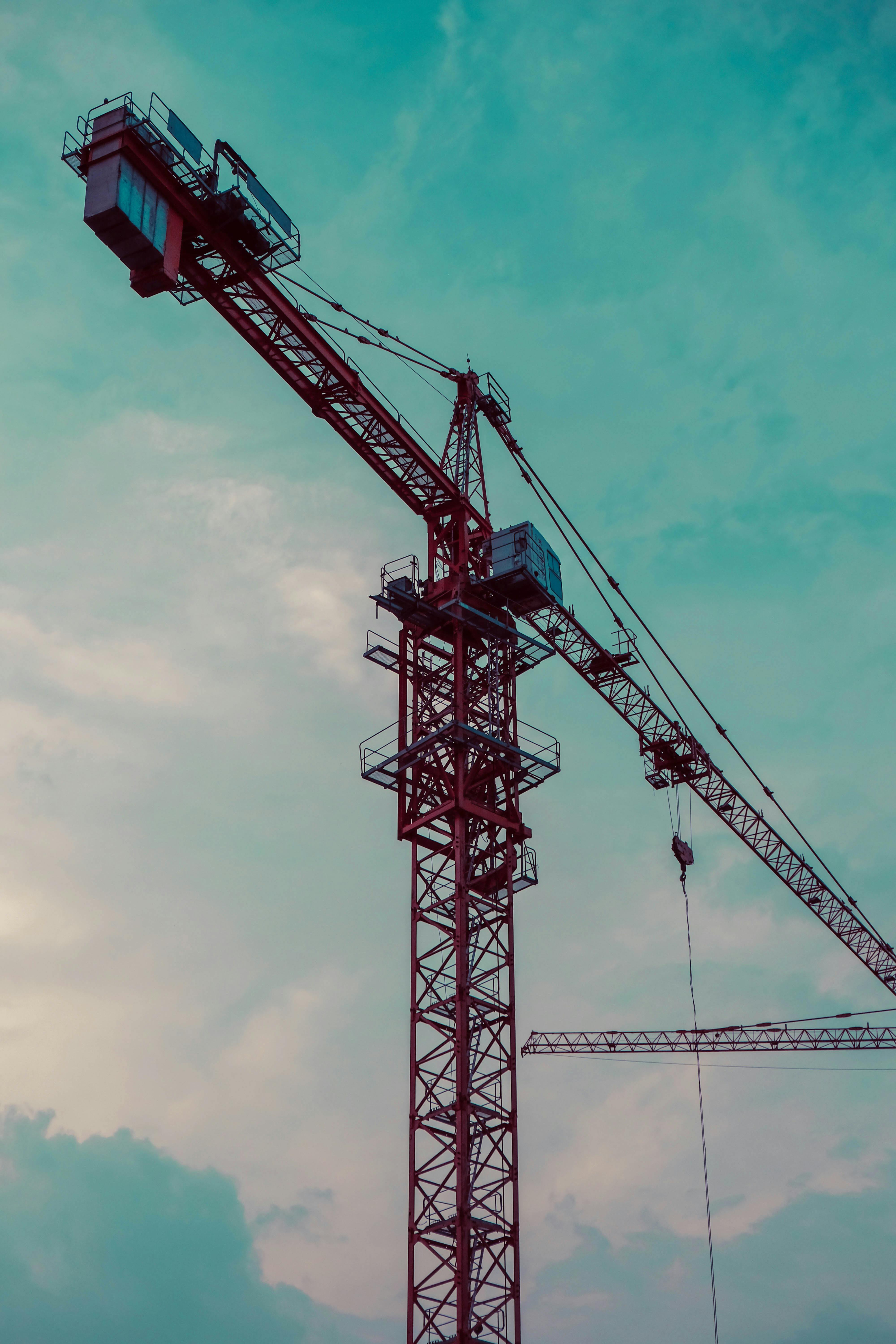 Tower Crane with Clouds Background · Free Stock Photo