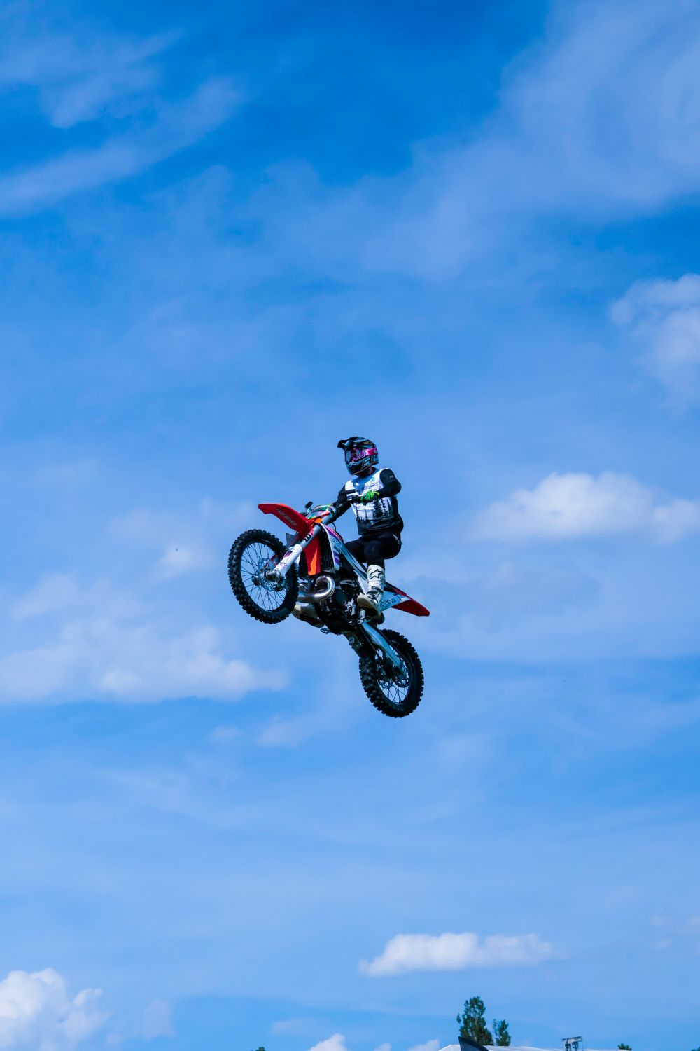 Photo of a Man Jumping a Motorbike Midair · Free Stock Photo