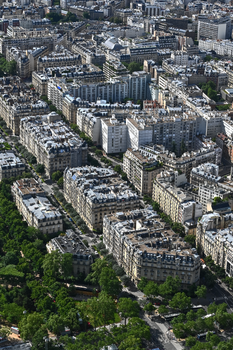 Aerial photograph showcasing the densely packed residential buildings in Paris, France.