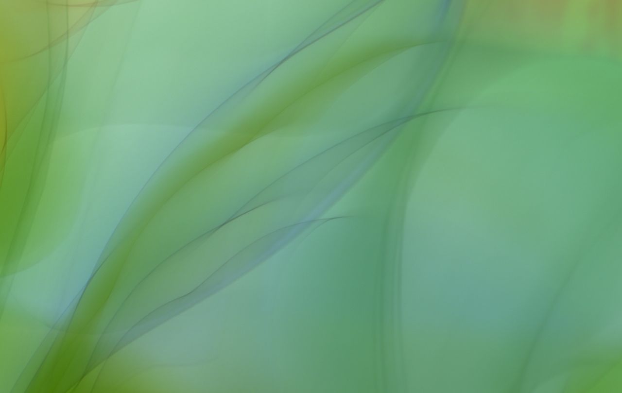vibrant abstract waves in green and blue shades create a soothing arti