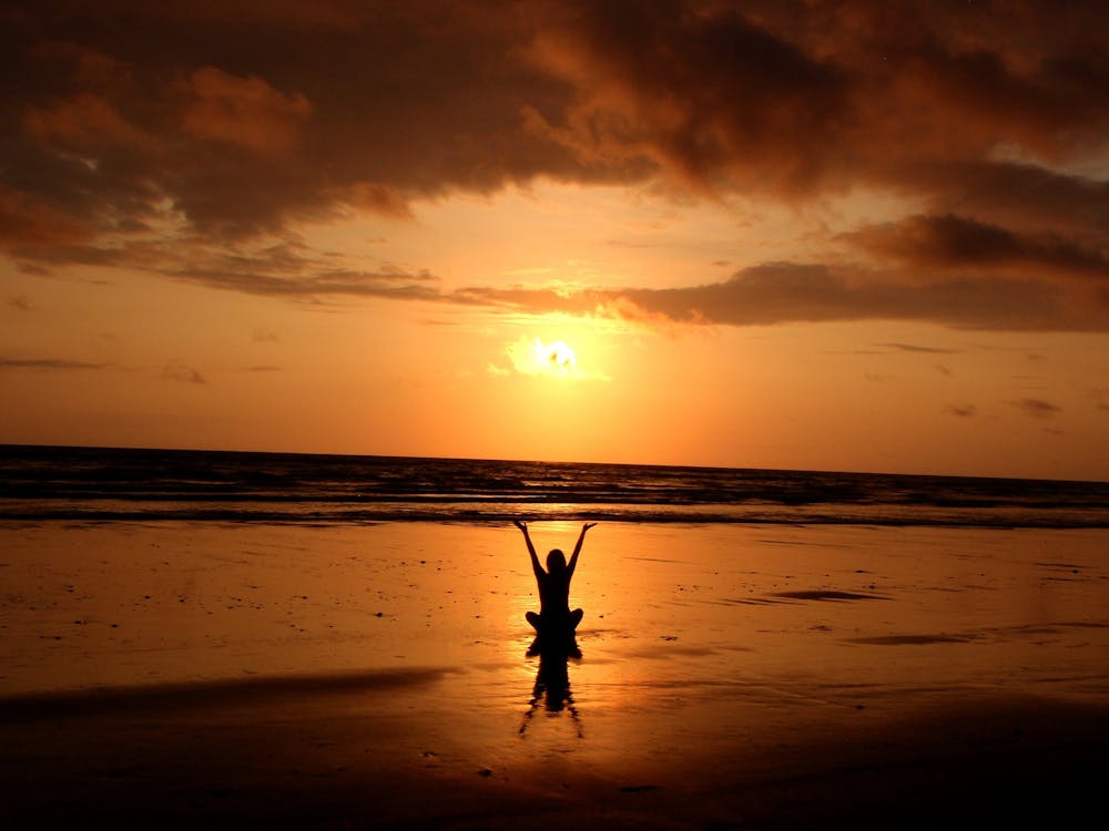 Free Silhouette of Person Raising Its Hand Stock Photo