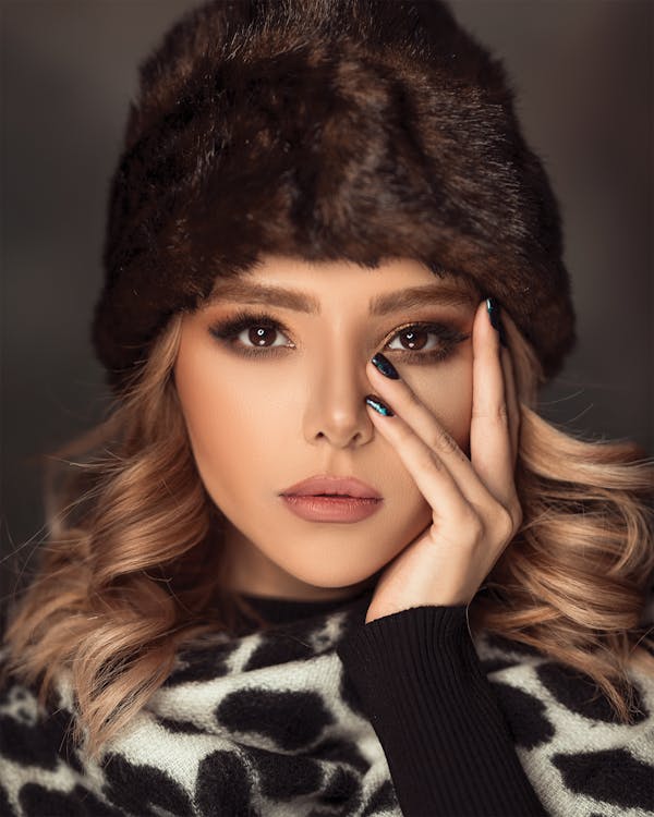 Free Woman Wearing Brown Fur Beanies and White and Balck Top Stock Photo-Fashion-photography