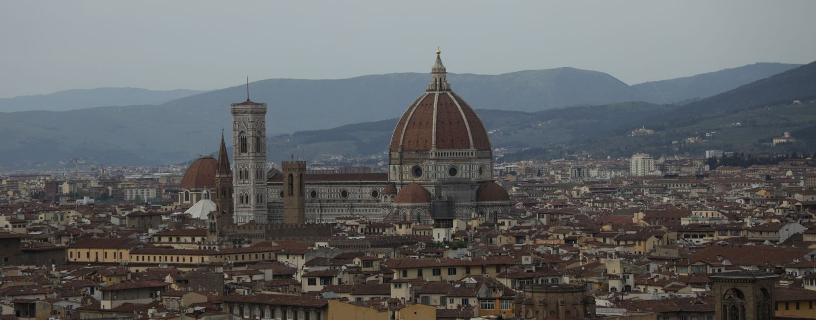 Captivating aerial view of Florence with the iconic Cathedral and historic skyline.