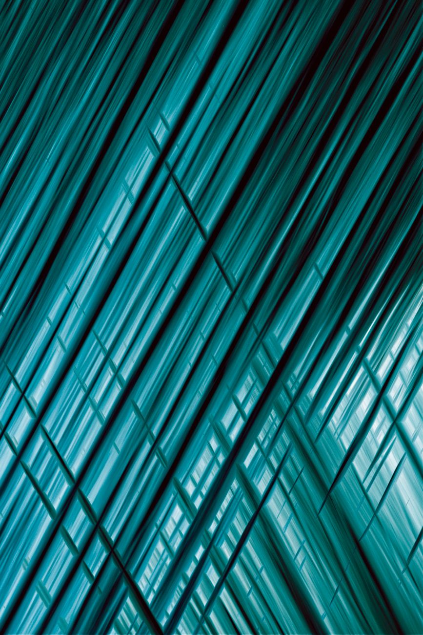 Dynamic abstract art featuring geometric lines creating a futuristic and ethereal effect.