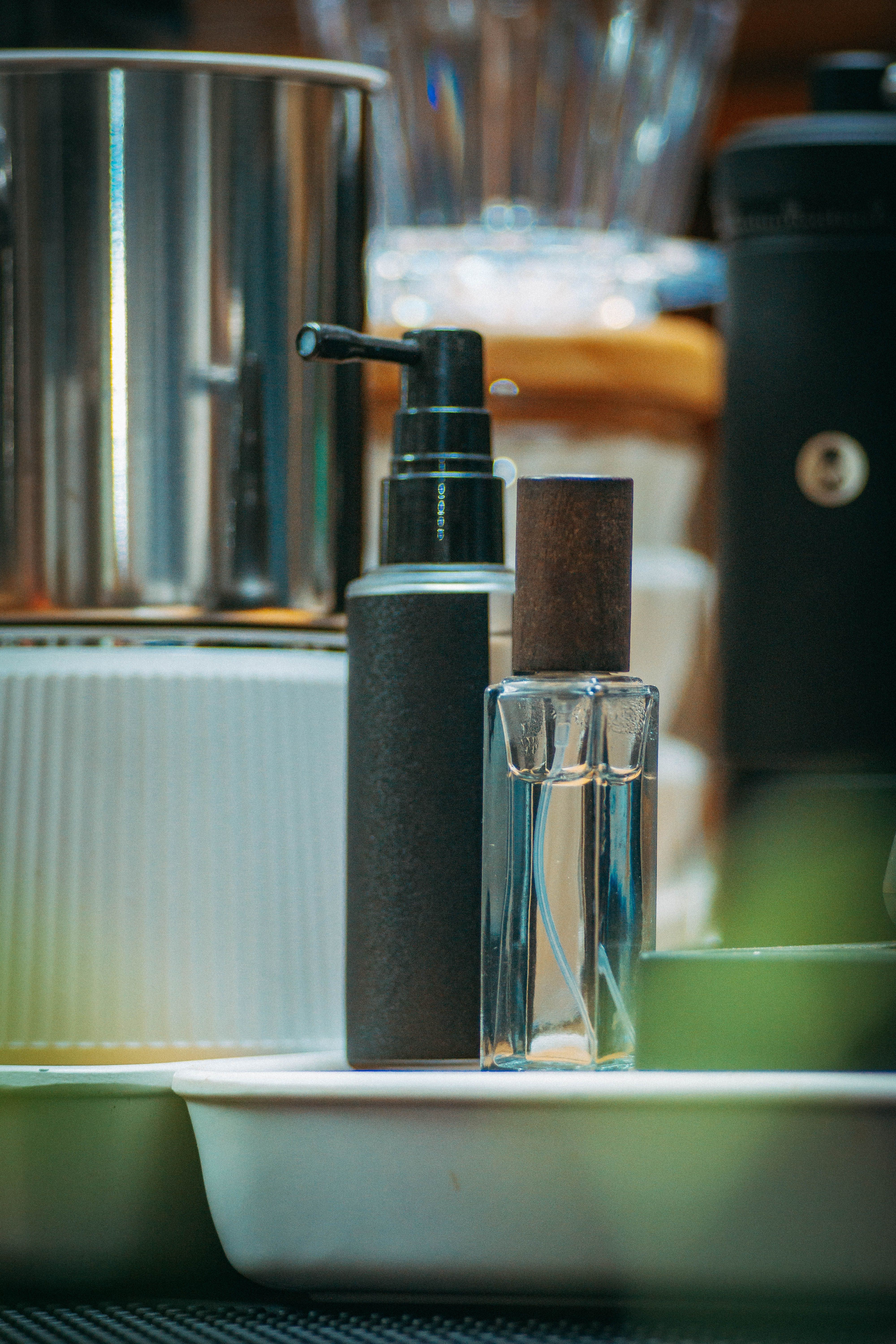 Elegant cosmetic containers displayed in a chic, stylish setup indoors.