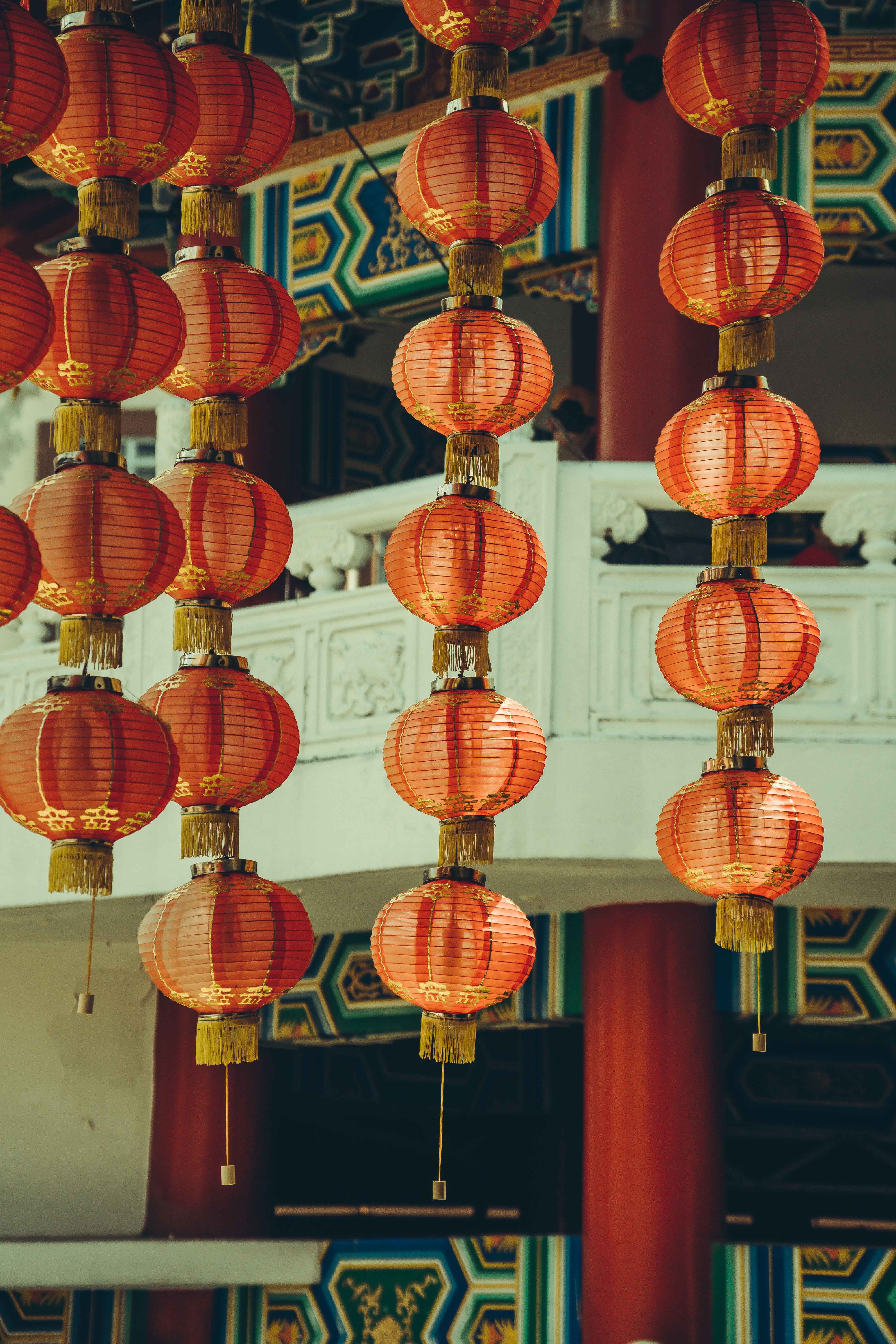 Red lanterns hanging from the ceiling of a chinese temple · Free Stock ...