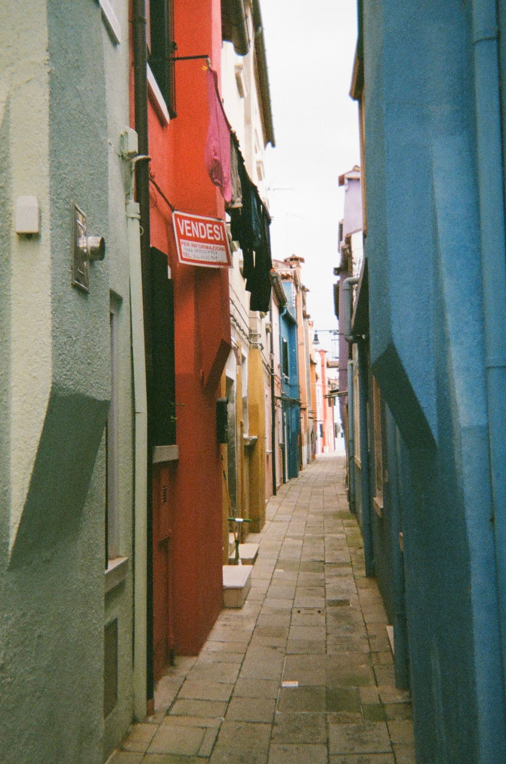 A Narrow Alley between Colorful Buildings · Free Stock Photo