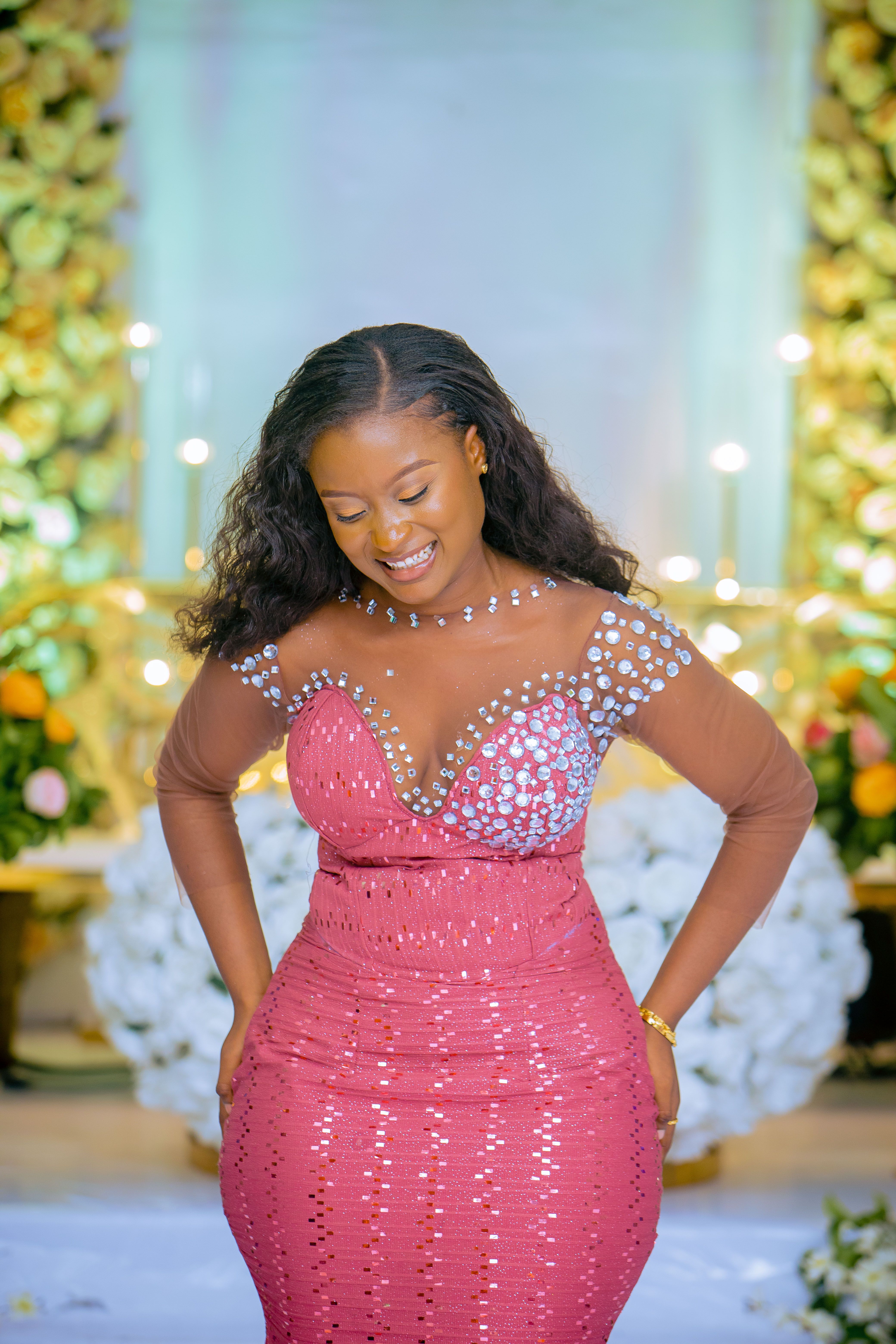 Photo of a Young Woman Wearing an Elegant Pink Dress · Free Stock Photo