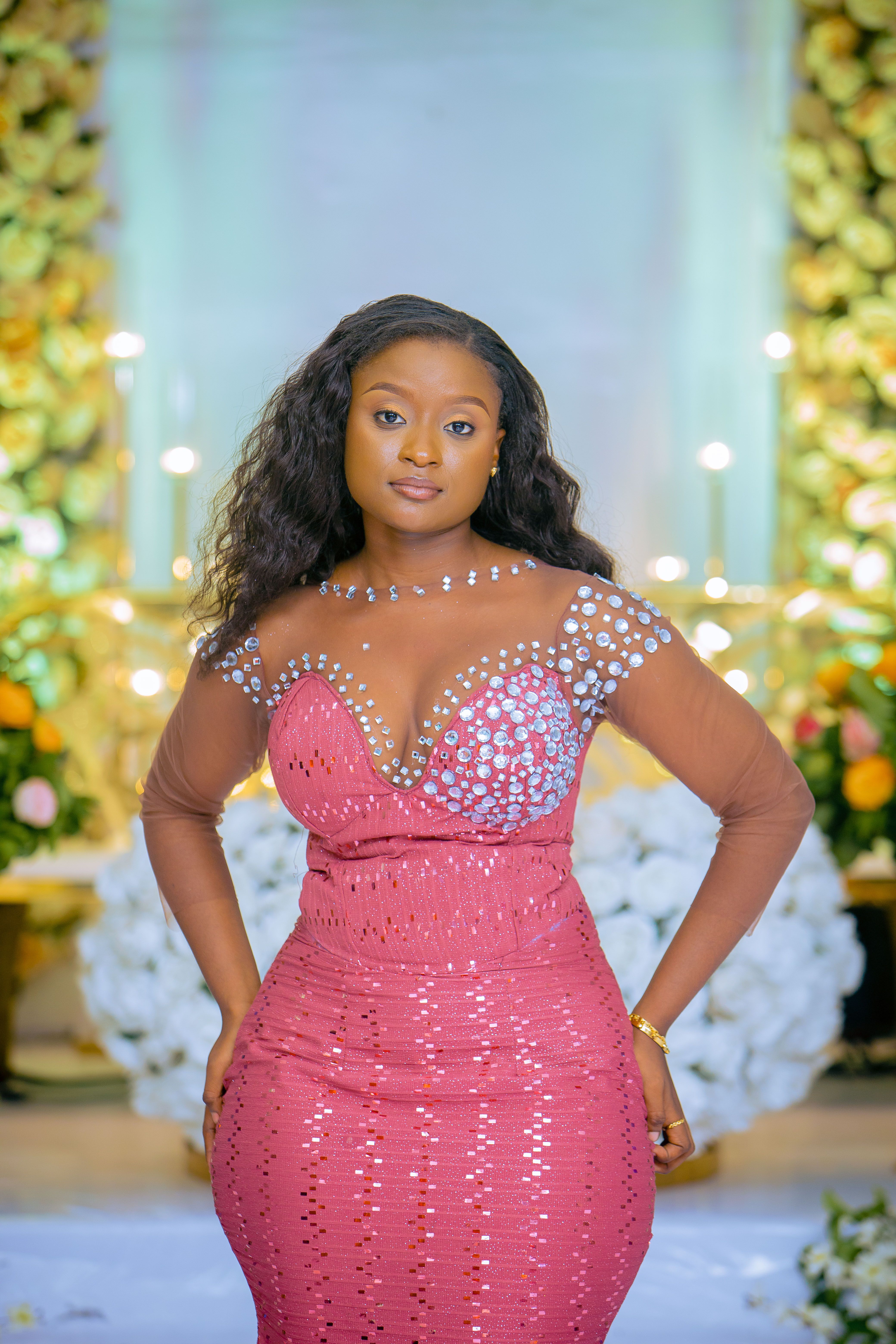 Photo of a Young Woman Wearing an Elegant Pink Dress · Free Stock Photo