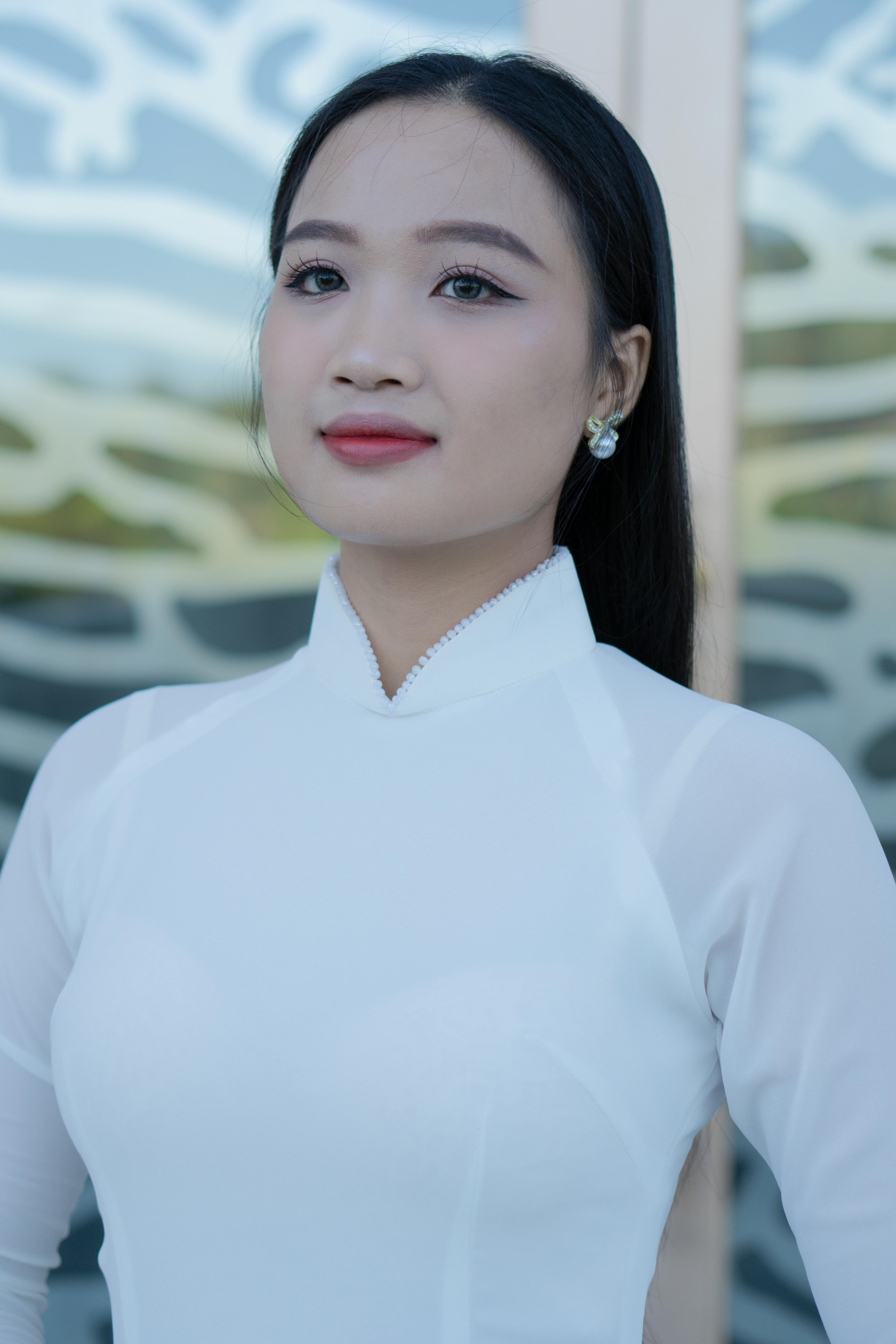 Beautiful portrait of a woman wearing a traditional ao dai, symbolizing Vietnamese culture and elegance.