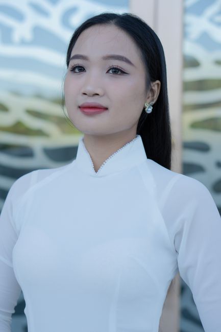 Beautiful portrait of a woman wearing a traditional ao dai, symbolizing Vietnamese culture and elegance.