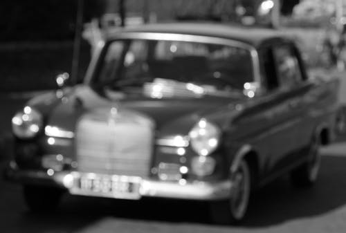 Free stock photo of black and white, blurred car, mercedes