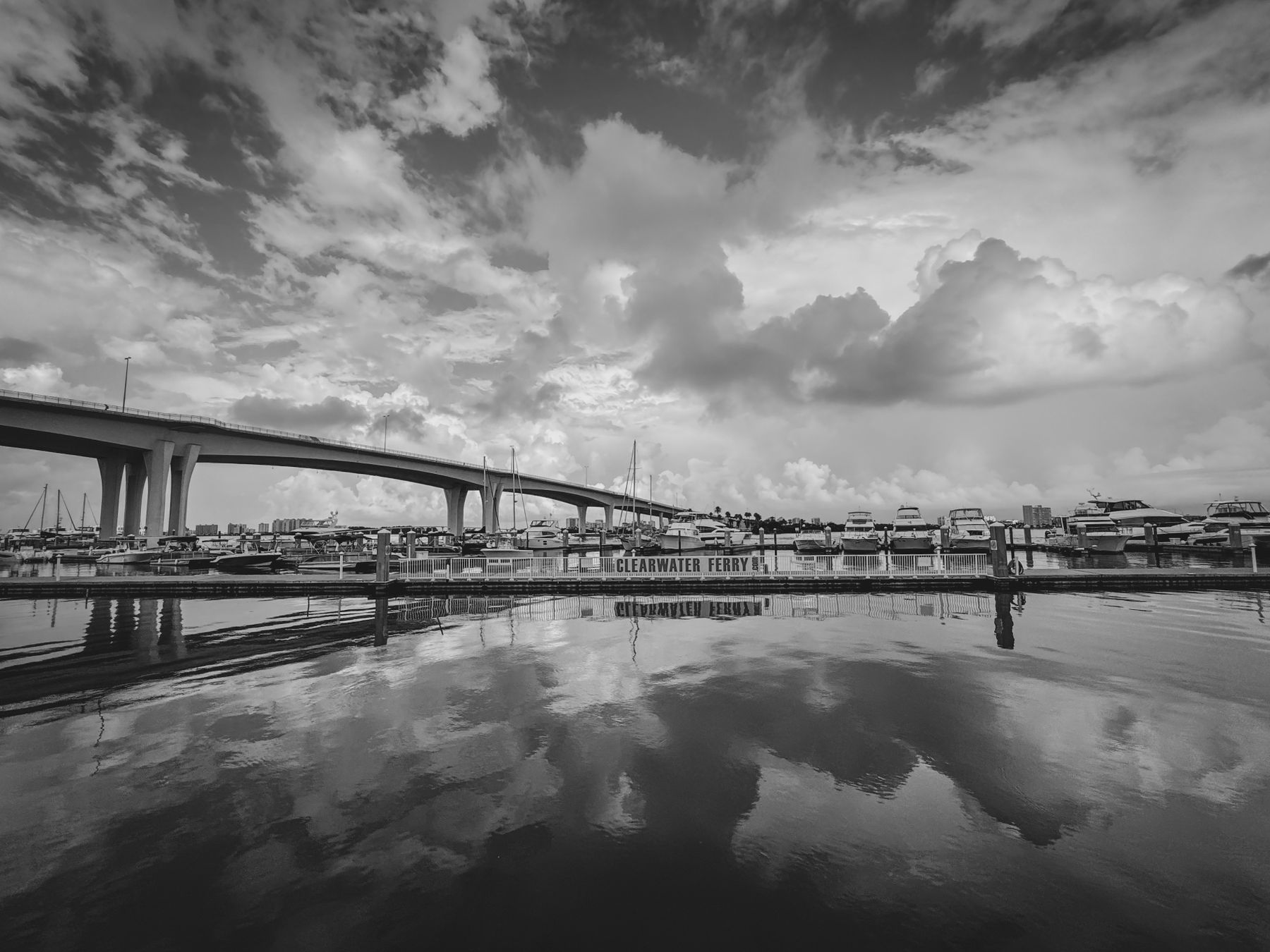 Boats and waterway near a bridge