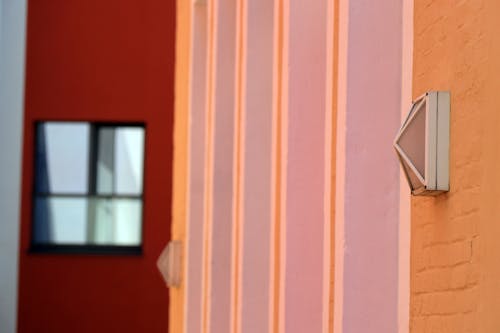 Free stock photo of lamp, red yellow orange tones, walls