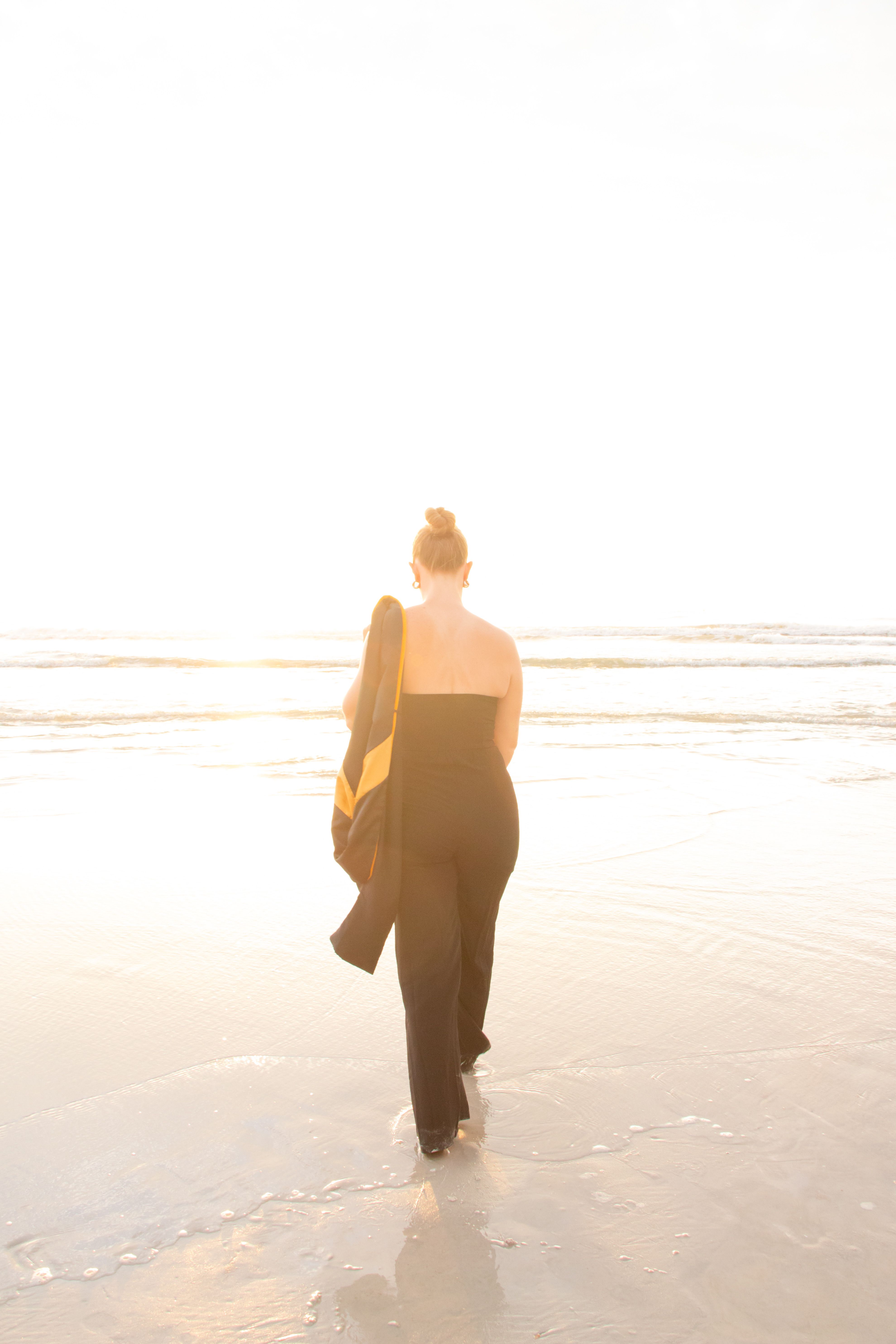A Woman in a Hijab Walking at the Beach · Free Stock Photo