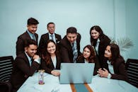 A Group of People with a Laptop