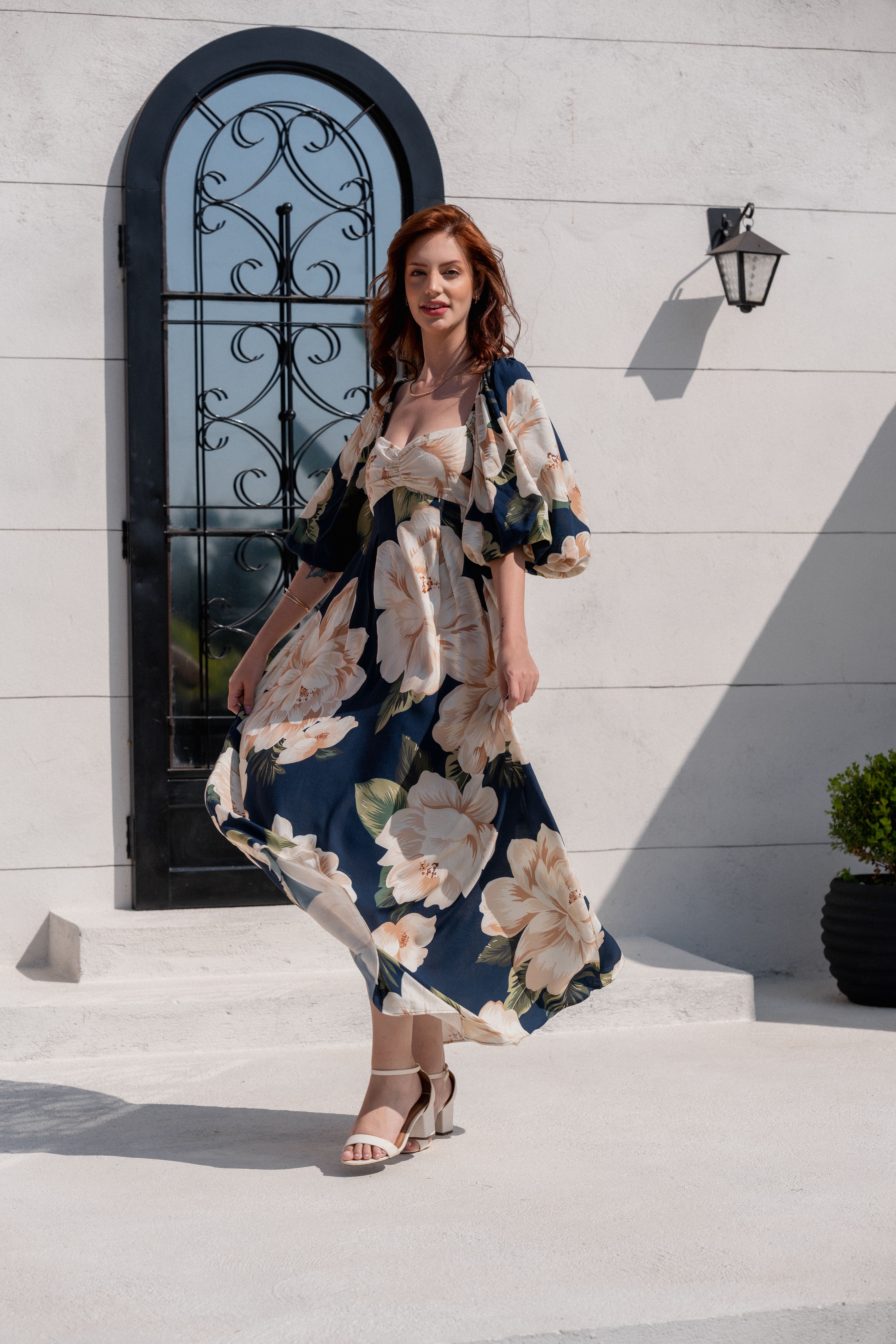 Woman in a Floral Dress and High Heels · Free Stock Photo