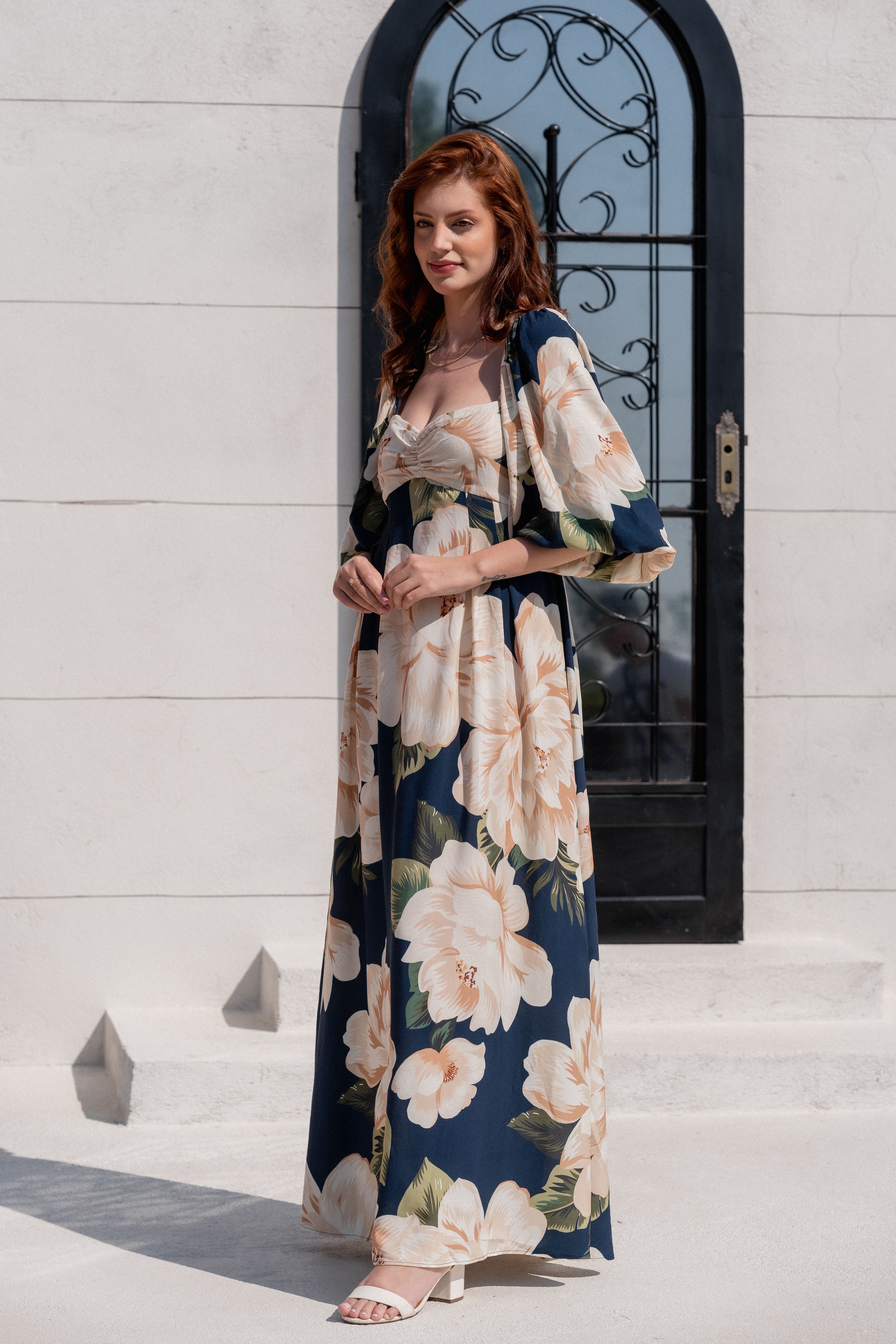 Portrait of a Woman in a Floral Dress · Free Stock Photo
