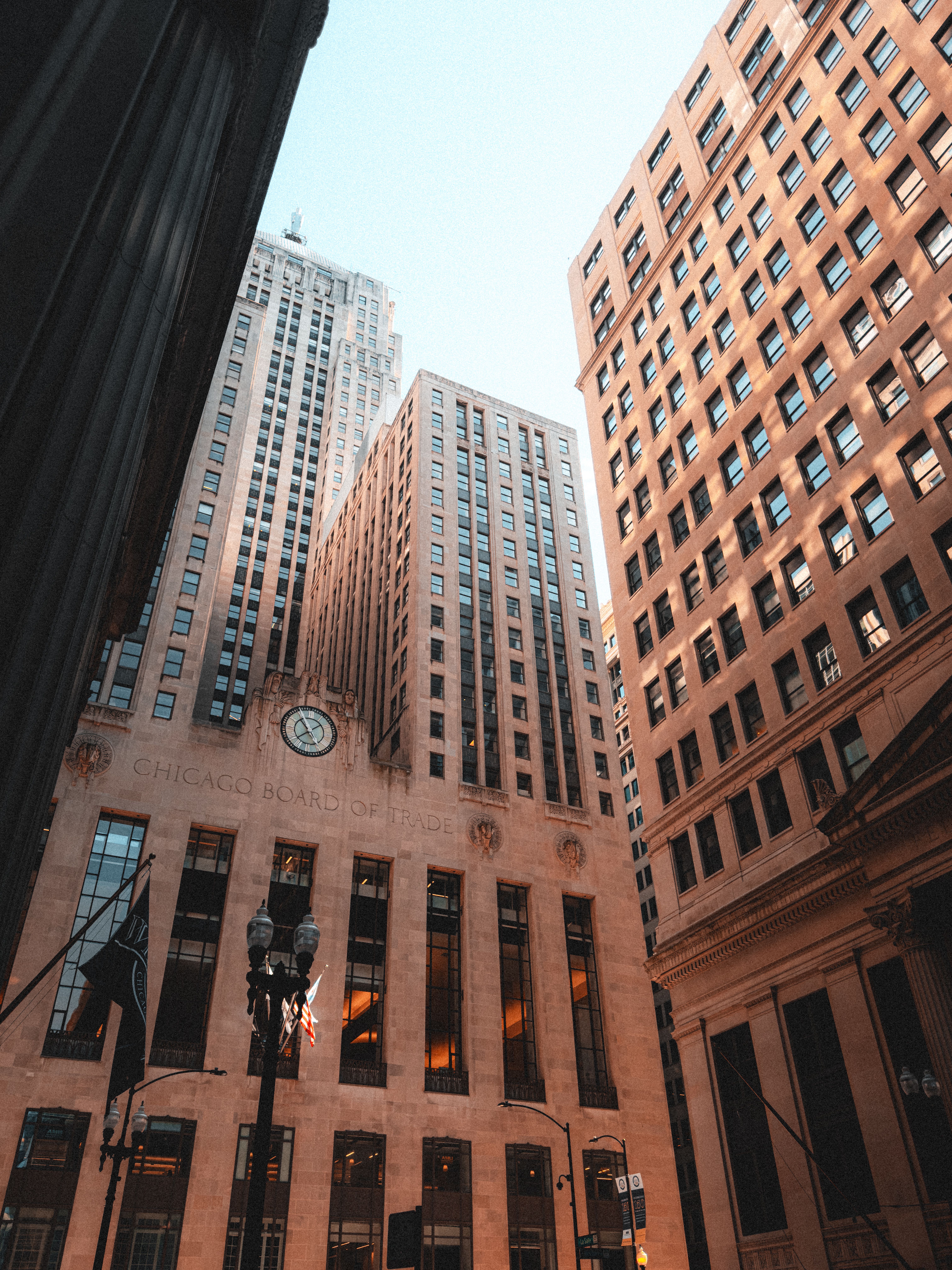 Low-angle view of a Loop skyscraper in Chicago's financial district near the Kimpton Gray Hotel