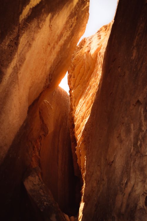 Free Sunlit rocky canyon in Baku, Azerbaijan showcasing golden geology and textures. Stock Photo