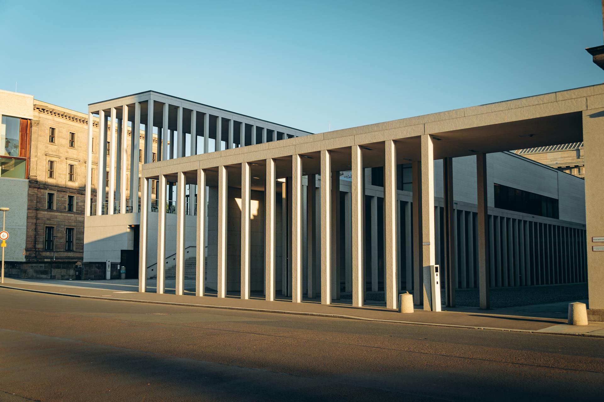 Exterior shot of the James Simon Gallery in Berlin, showcasing modern colonnade design.