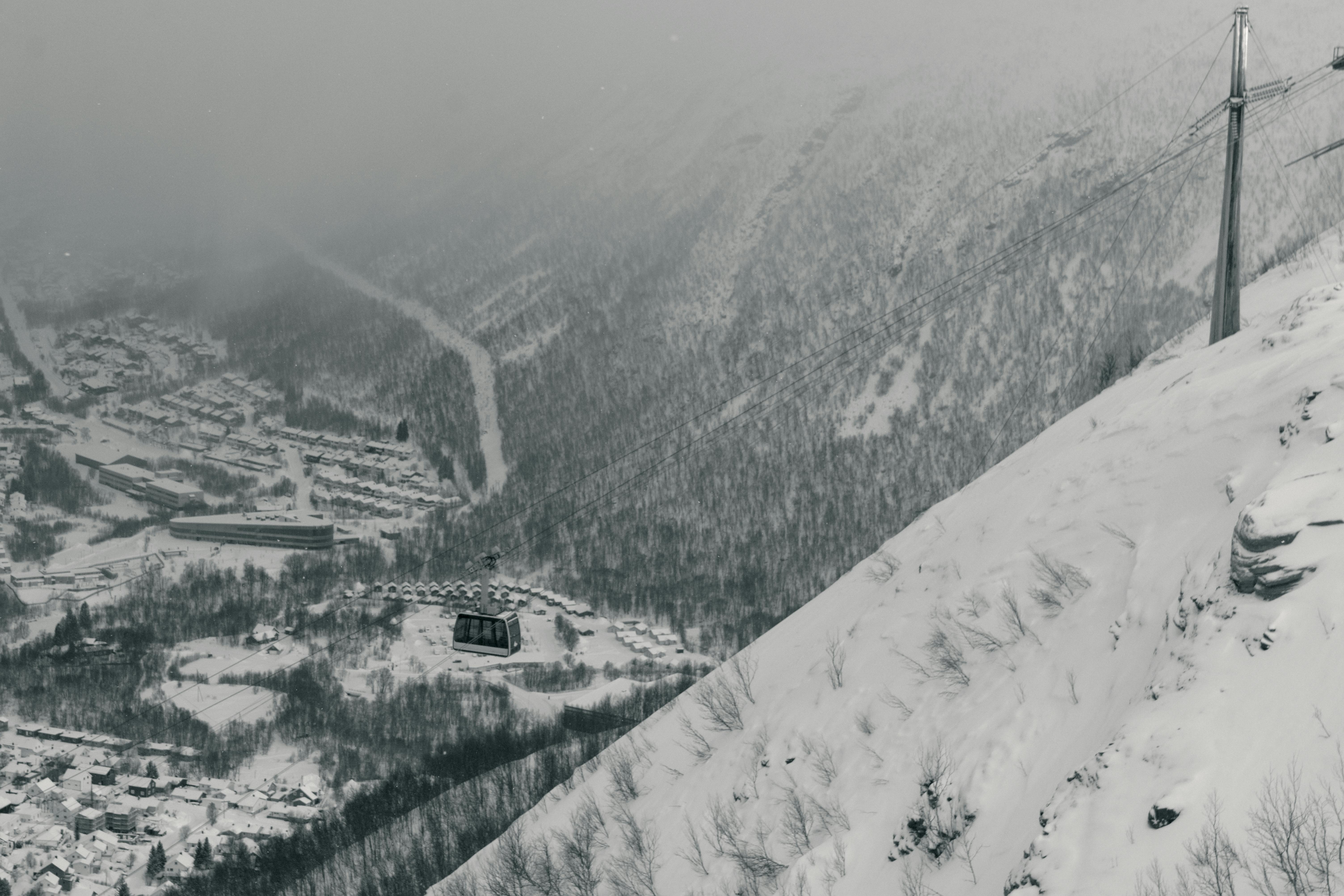 Prescription Goggle Inserts - Captivating aerial photo of a snow-covered Tromsø with a cable car ride.