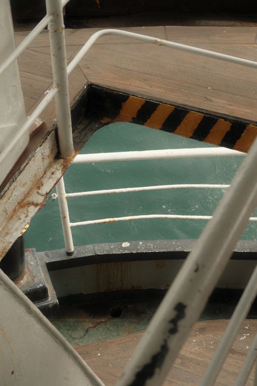 Free Close-up view of a ship's railing with a glimpse of the water in İstanbul, Türkiye. Stock Photo