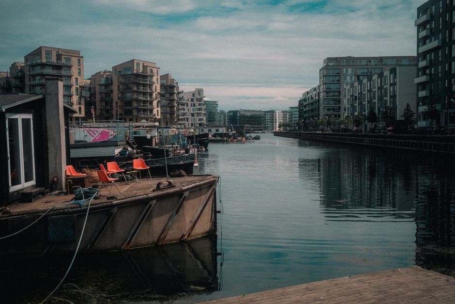 View of contemporary apartments along a canal in Copenhagen, Denmark.