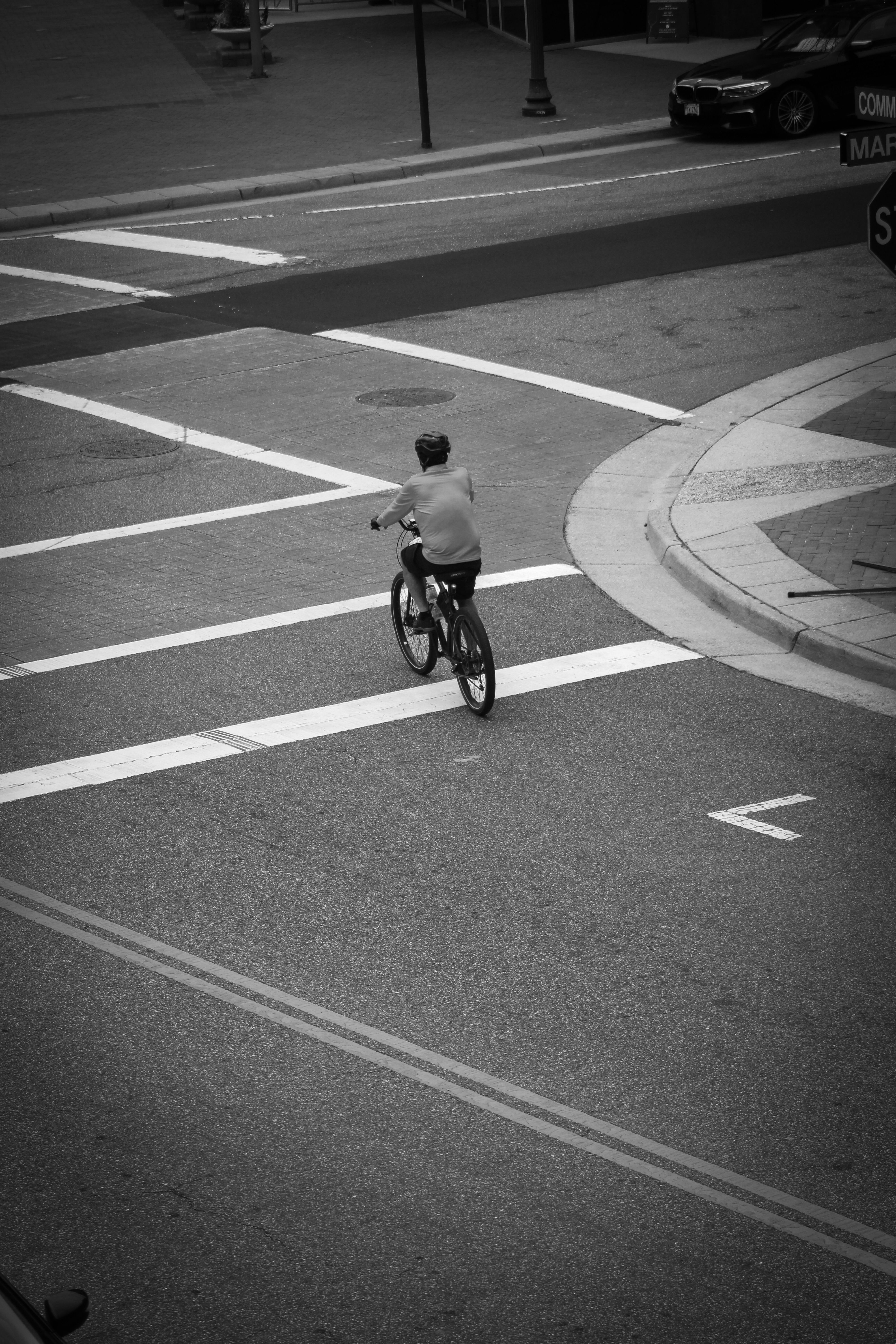 Person Riding Bicycle on Street · Free Stock Photo