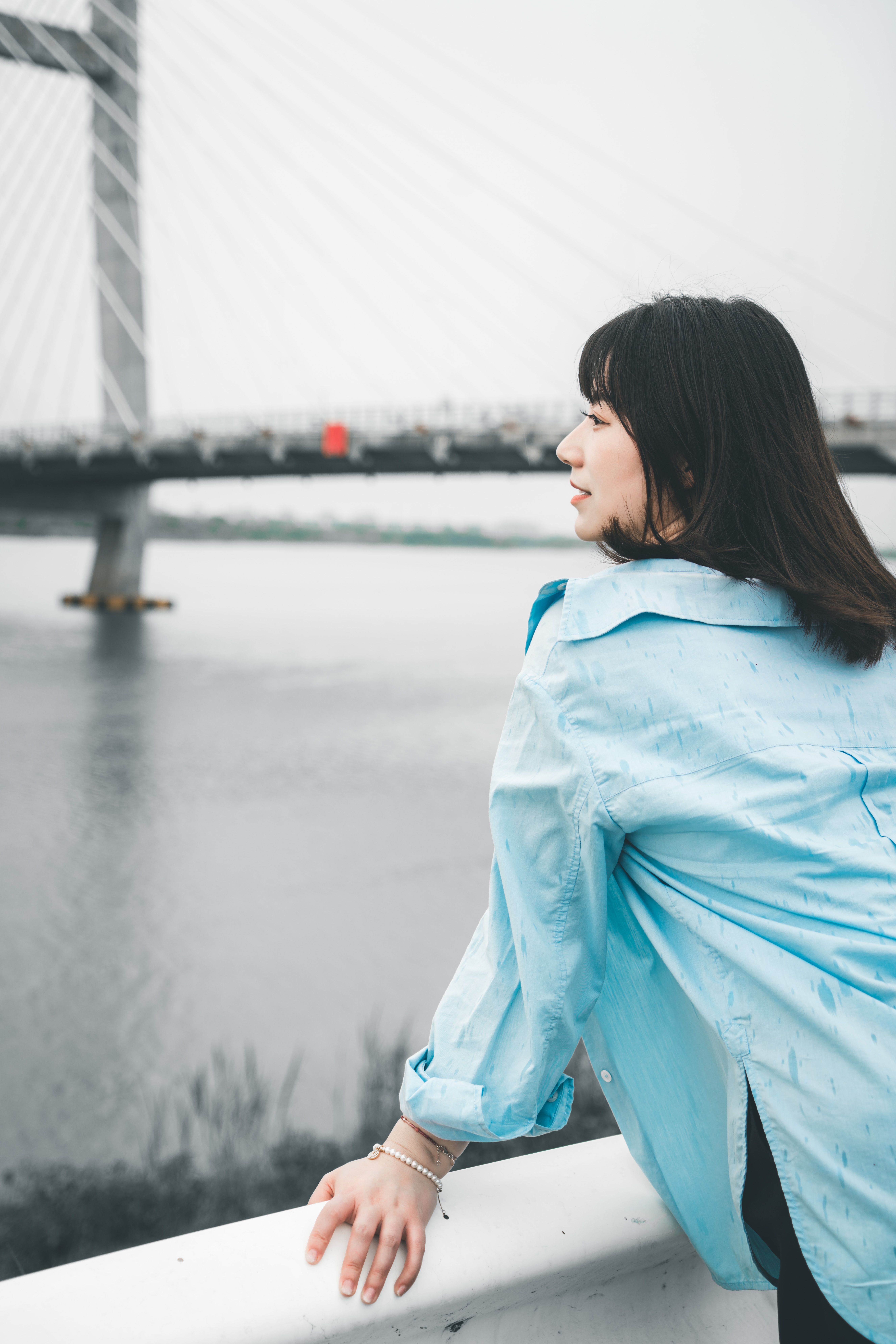 A Woman Standing by a River · Free Stock Photo