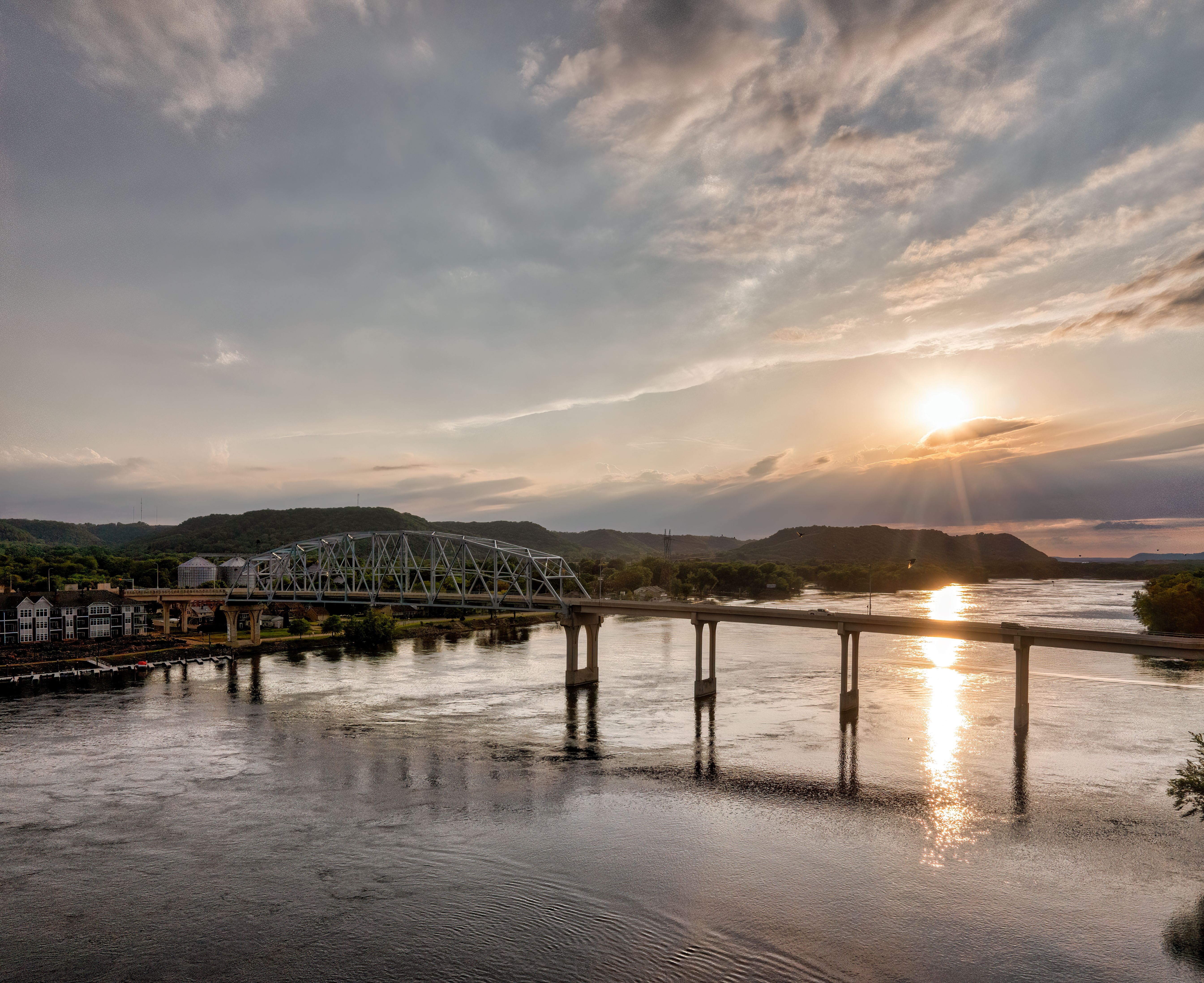 Aerial View of a Bridge over a River at Sunset · Free Stock Photo