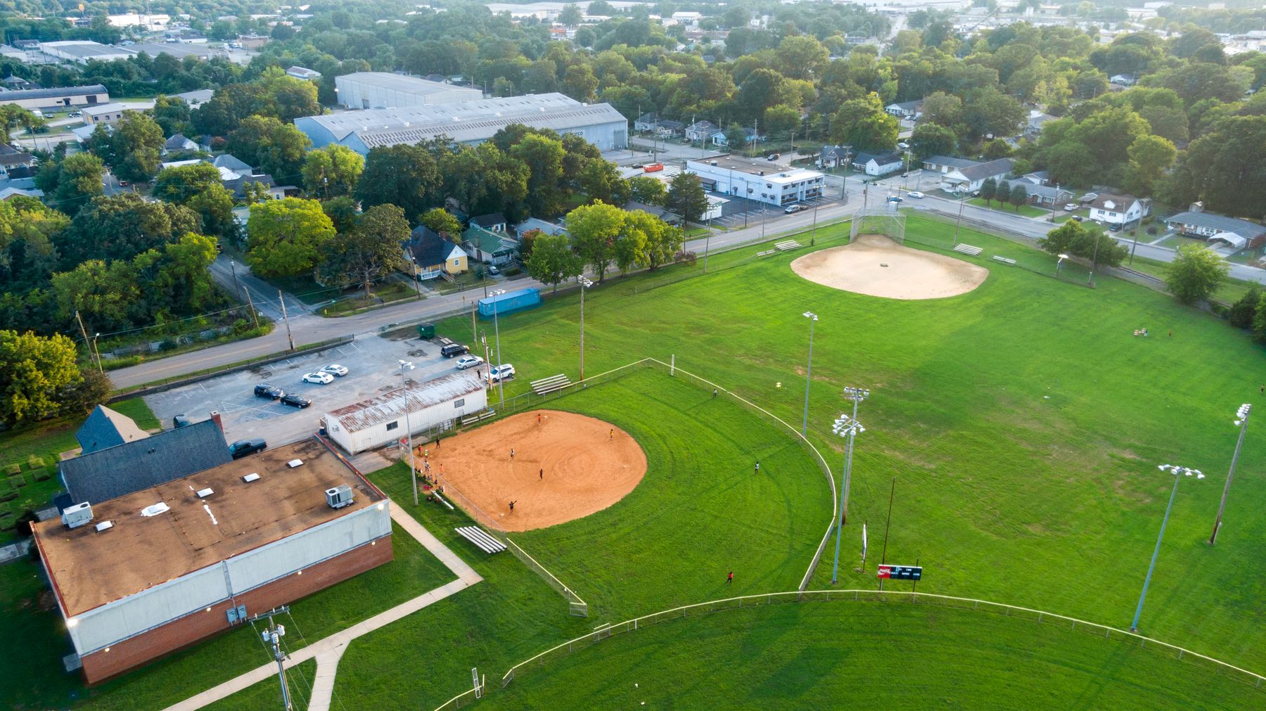 Aerial view of a baseball park with two diamonds