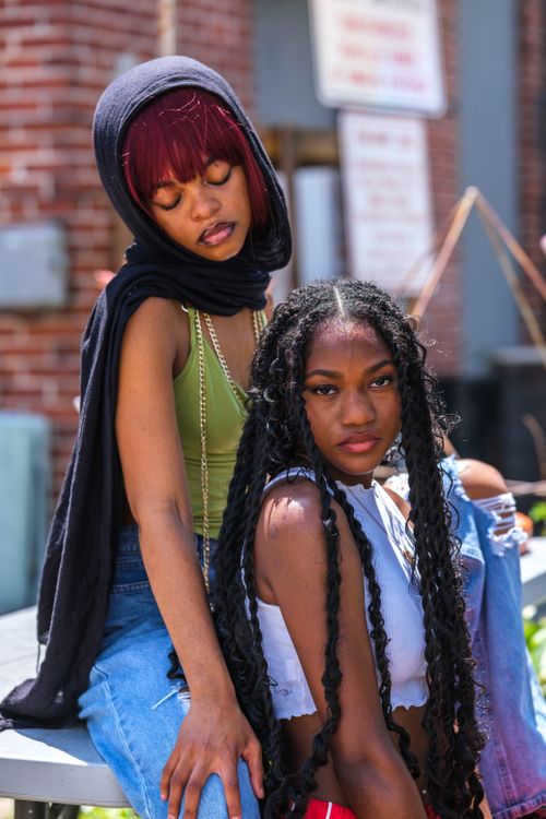 Free Two fashionable women posing outdoors, showcasing modern street style in Gainesville. Stock Photo