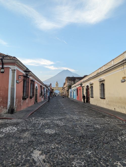Free Charming streets of Antigua Guatemala with Agua Volcano in the background, perfect travel destination. Stock Photo