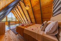 Warm timber-lined loft interior, photo by Ahmet ÇÖTÜR on Pexels