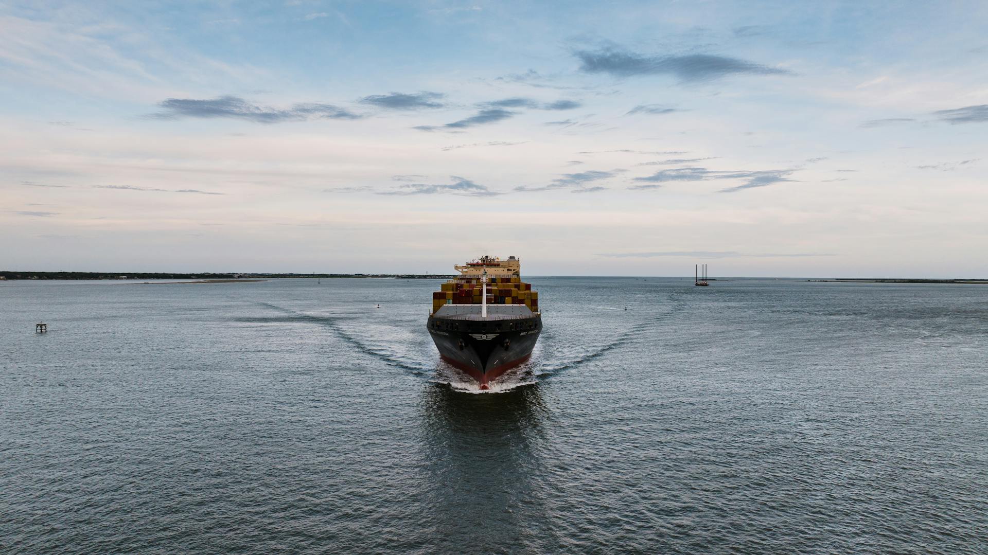 Large Container Ship Sailing on Water