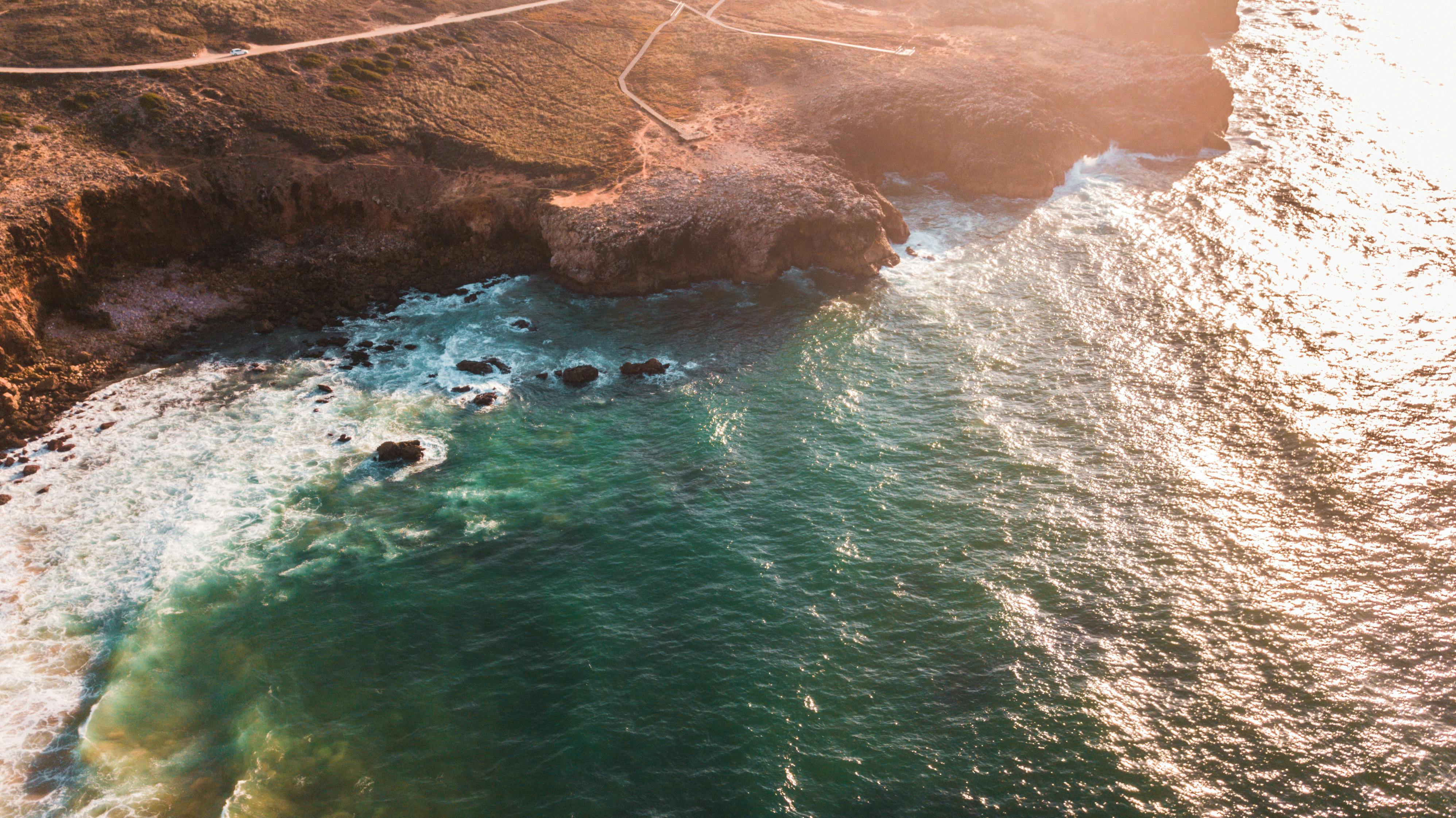 Aerial View of Cliff Near Ocean · Free Stock Photo